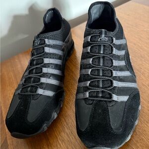 $10 plus $4.99 shipping
Skechers Black and Gray Slip-On Athletic Sneakers